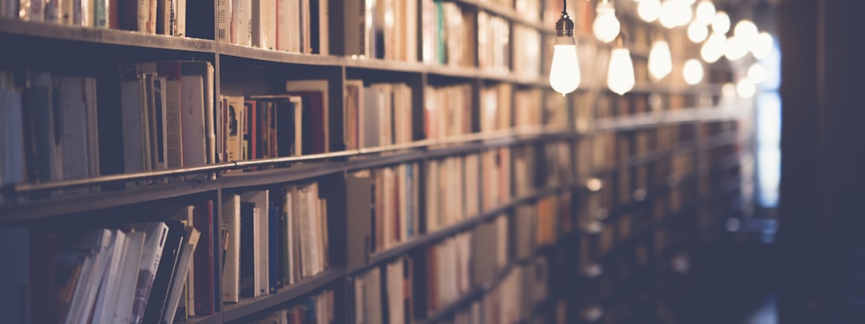 Books collected on library shelves